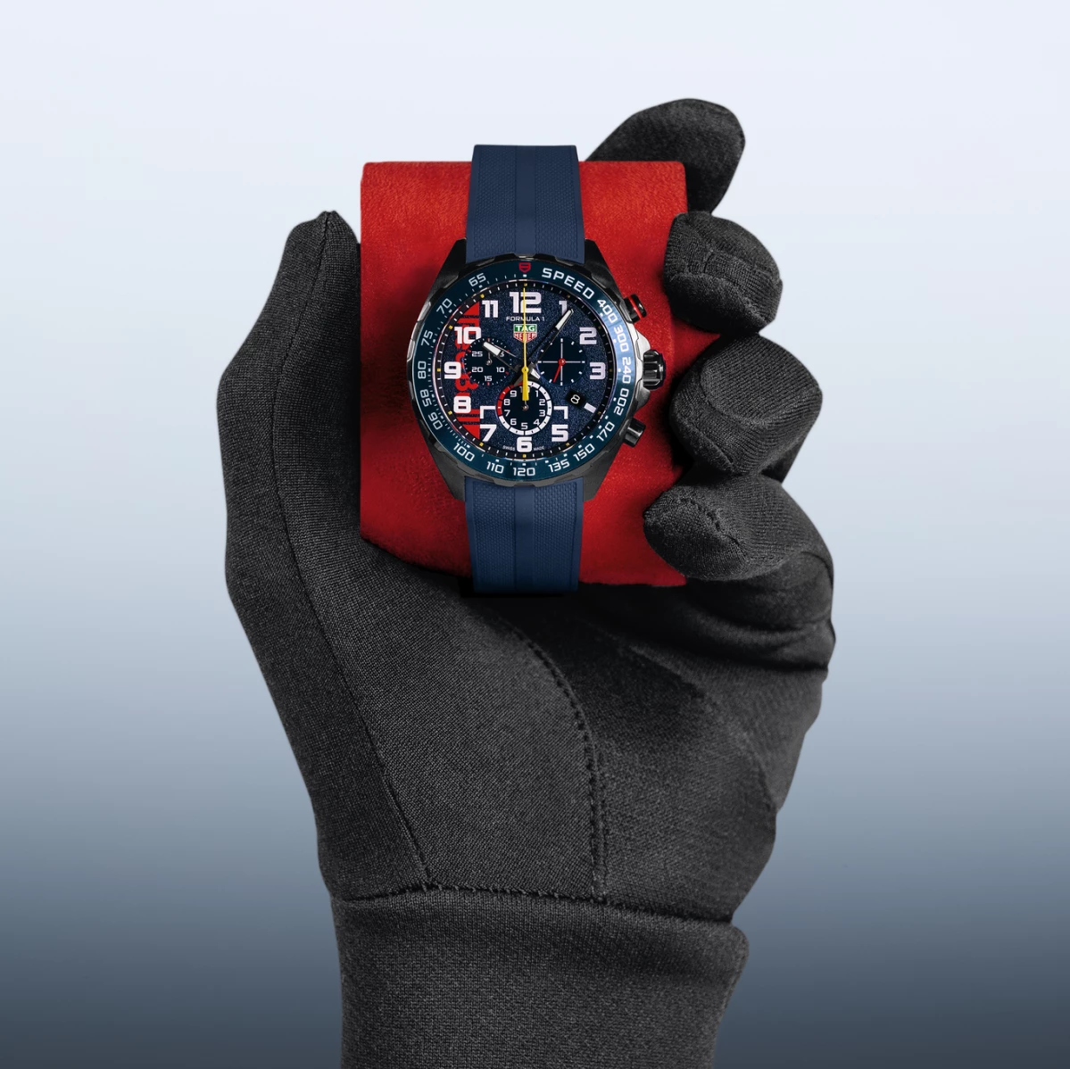 TAG Heuer Formula 1 Chronograph x Oracle Red Bull Racing Watch in gloved racing drivers hand