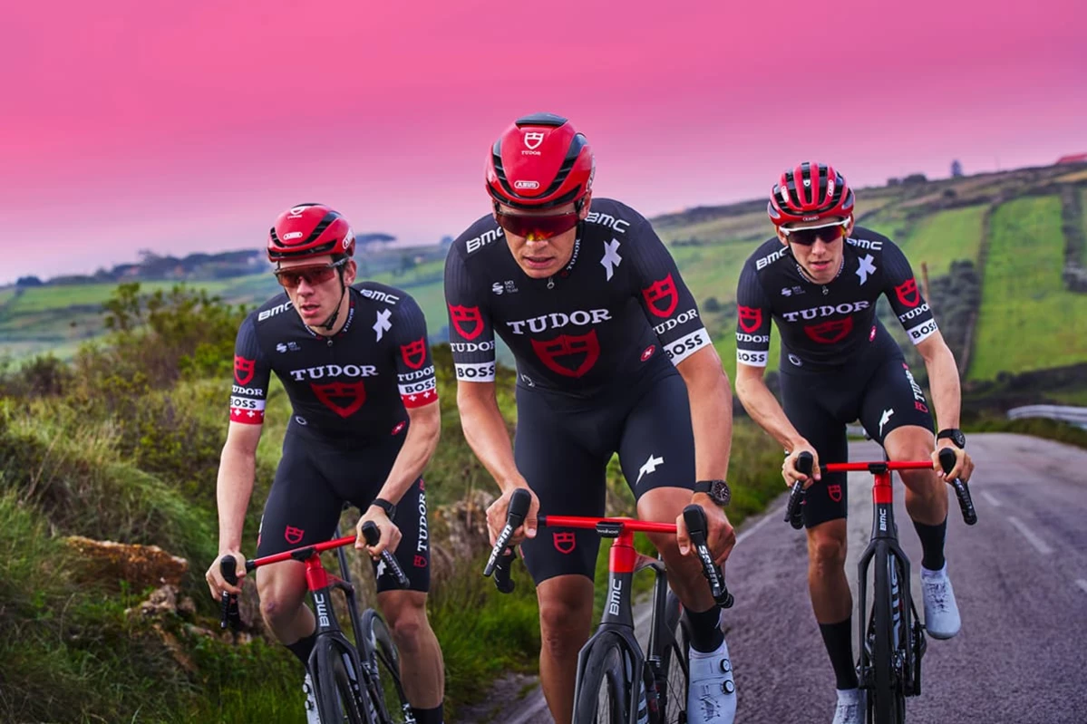 The Tudor Pro Cycling team cycling whilst wearing the new Tudor Pelagos FXD Cycling Edition