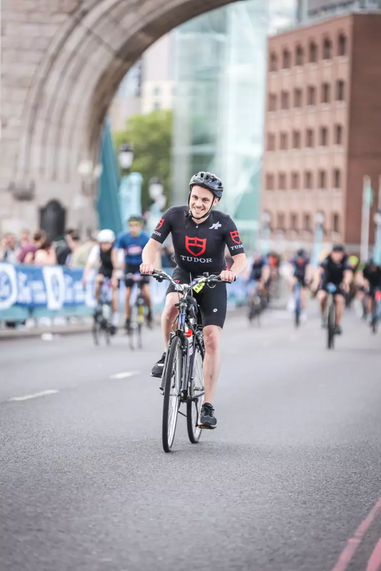 Rob taking part in Ride London as part of Team Tudor on behalf of Baker Brothers