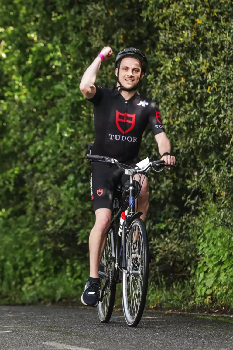 Rob taking part in Ride London as part of Team Tudor on behalf of Baker Brothers