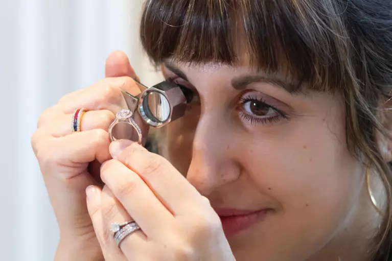 Stef, our repair specialist assessing a ring at Baker Brothers