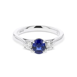 18ct White Gold Oval Sapphire & Brilliant Cut Diamond Three Stone Ring