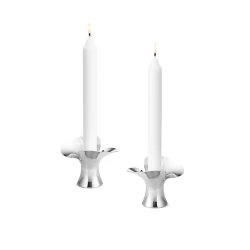 Georg Jensen Bloom Taper Candle Holders with lit candles