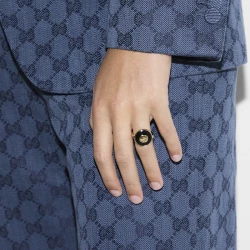 Gucci Interlocking Yellow Gold Onyx Ring on model