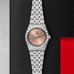 Tudor Royal 34mm Salmon Dial Long on black and red background